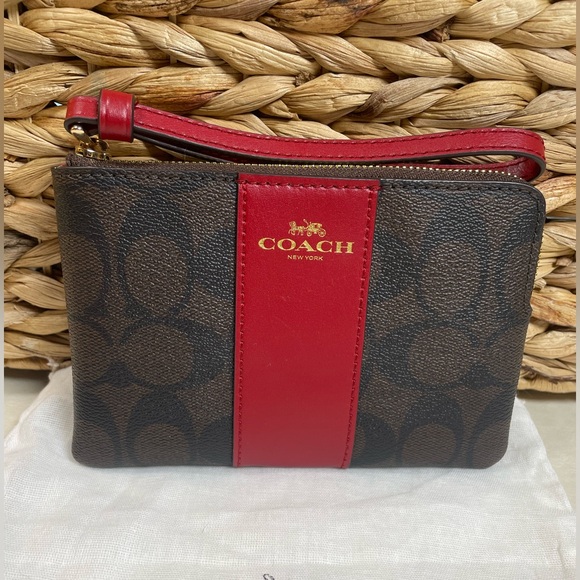 Coach Handbags - ‼️SPRING SALE Coach NWT Signature Brown and Red Wristlet